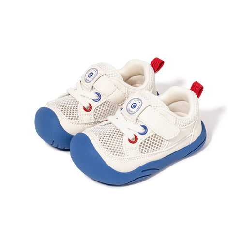 White EBMINI AERO toddler sneakers with blue rubber toe and outsole, front three-quarter view