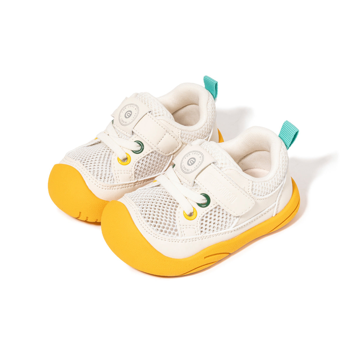 White EBMINI AERO toddler sneakers with yellow outsole, front three-quarter view