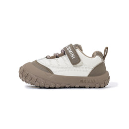 Side view of EBMINI BREEZE brown toddler sneaker with flexible segmented sole