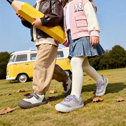 Kids wearing EBMINI BREEZE brown and purple sneakers outdoors