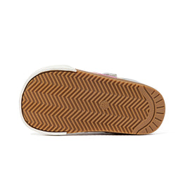 Brown rubber outsole of EBMINI DOTE toddler sneaker with herringbone tread