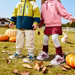 EBMINI ESCAPE child wearing the sneakers during active playground play