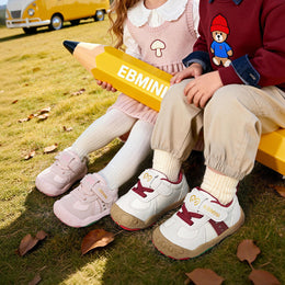 EBMINI FLEXI child wearing the sneakers during active playground play