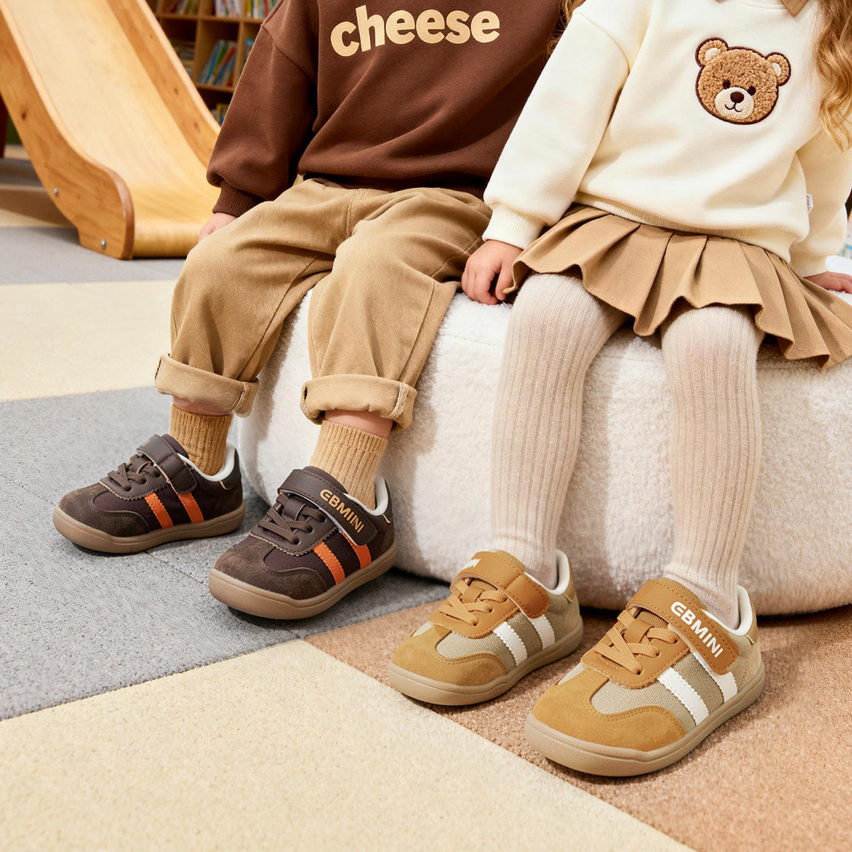 Children wearing EBMINI GROOVE retro sneakers for casual indoor play