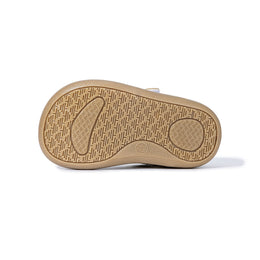 Bottom view of EBMINI GROOVE honeycomb-textured gum rubber outsole
