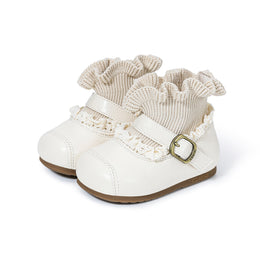 Cream EBMINI HEIRLOOM toddler boots, front three-quarter pair view