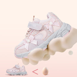 Pink EBMINI PEARL sneaker demonstrating soft flexible cushioning