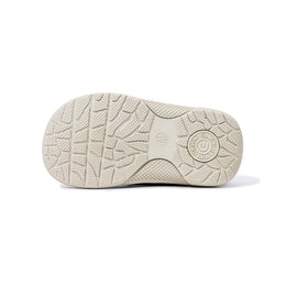 Bottom view of EBMINI RIDGE flexible deep-tread rubber outsole