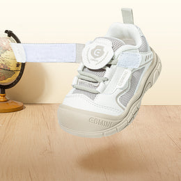 Close-up of EBMINI SHIELD badge strap and elastic lace closure