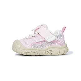 Side view of pink EBMINI SHIELD sneaker with protective rubber toe