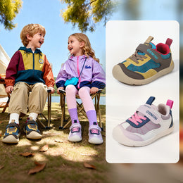 Child wearing blue EBMINI SKYPOP breathable toddler sneakers