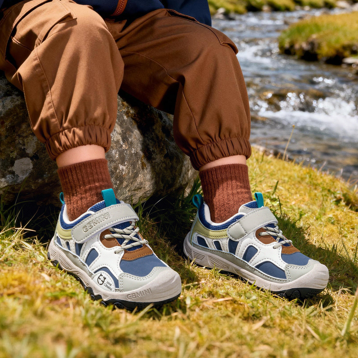 EBMINI VOYAGE toddler trail sneakers shown during an outdoor walk